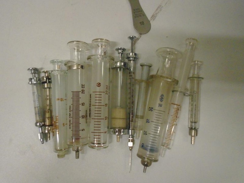 Period Glass and Metal Syringes